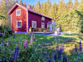 Herrfallet cottage in the forest